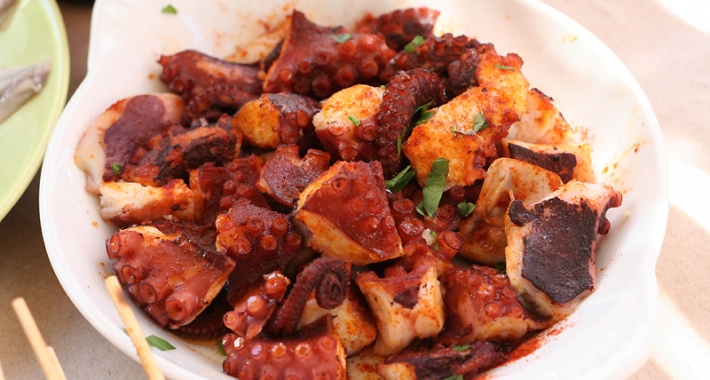 Octopus sliced into chunks and drizzled with lots of olive oil and spanish paprika