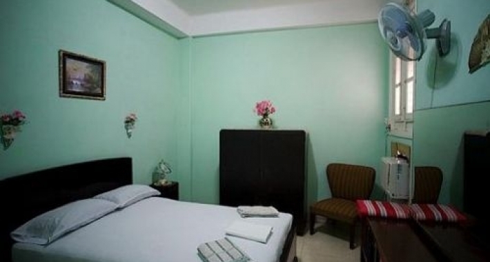 Camera da letto di una casa particular a L'Avana